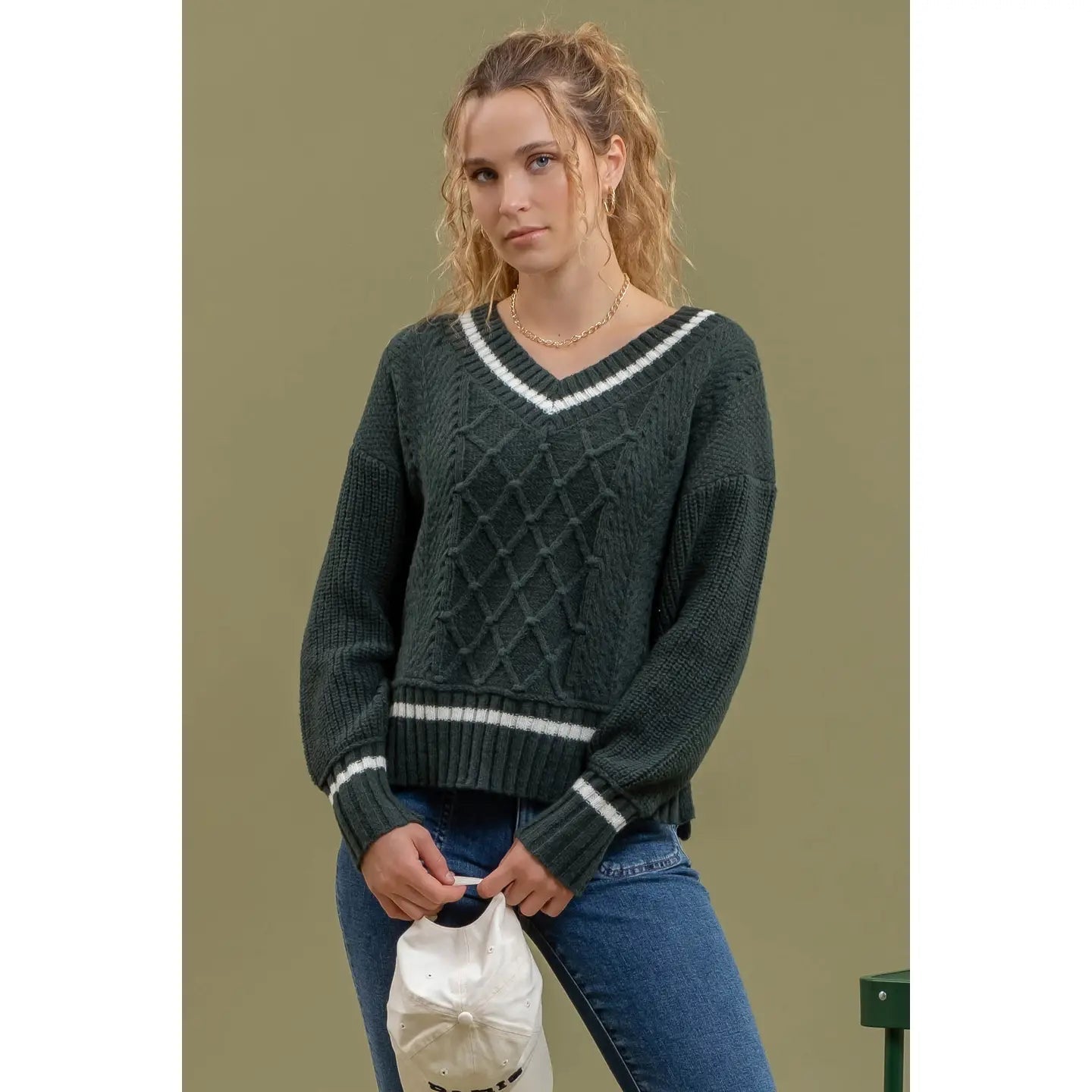 68afca774f14b22e4e032ac0_greenvsweater_1766422857126.jpeg