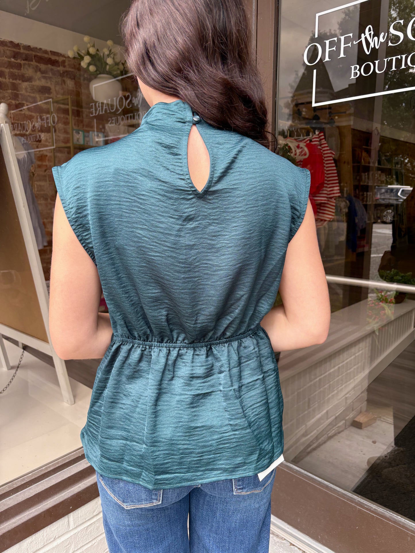 UC Sleeveless Asymmetric Twist Top